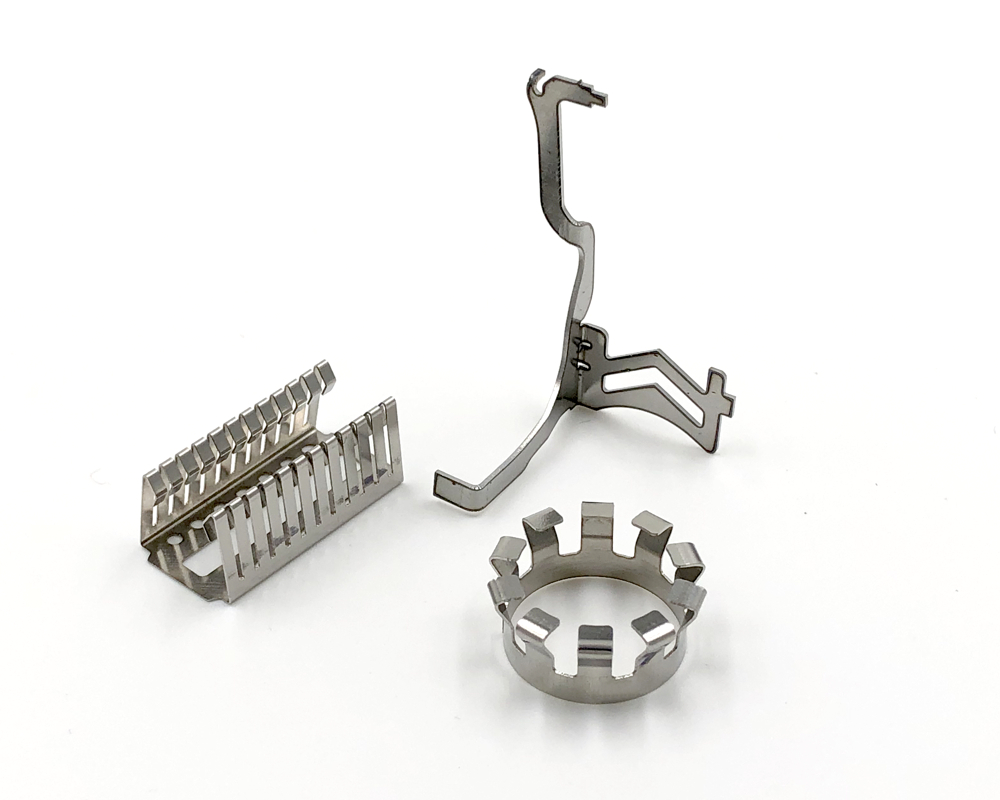 Springfeder What are flat springs and shaped springs? › Gutekunst Formfedern GmbH